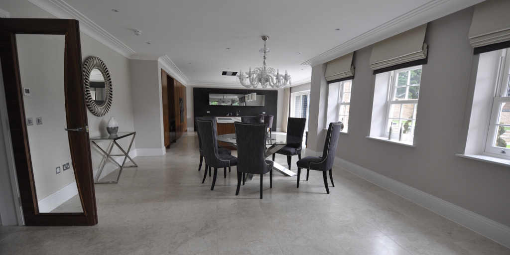 A dining room floor tiled by GB Tiling Ltd